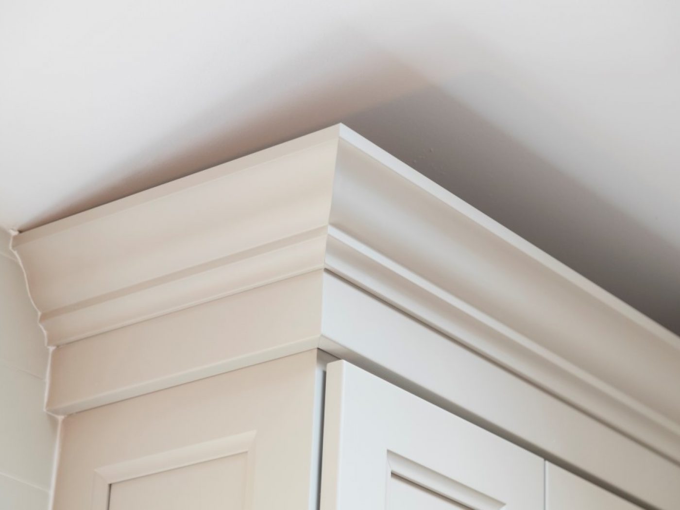 beautiful woodworking on cabinet