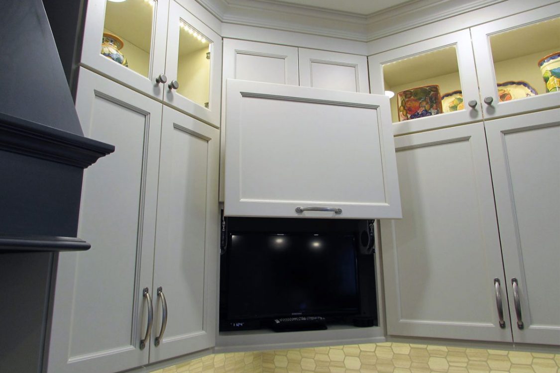 Custom TV cabinet built into kitchen