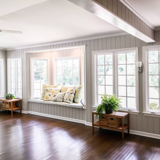 Bay window with gray shiplap wall