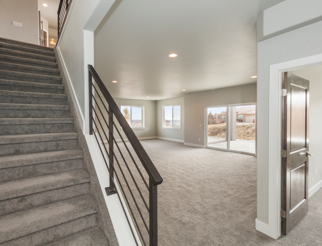 Newly remodeled basement with carpet