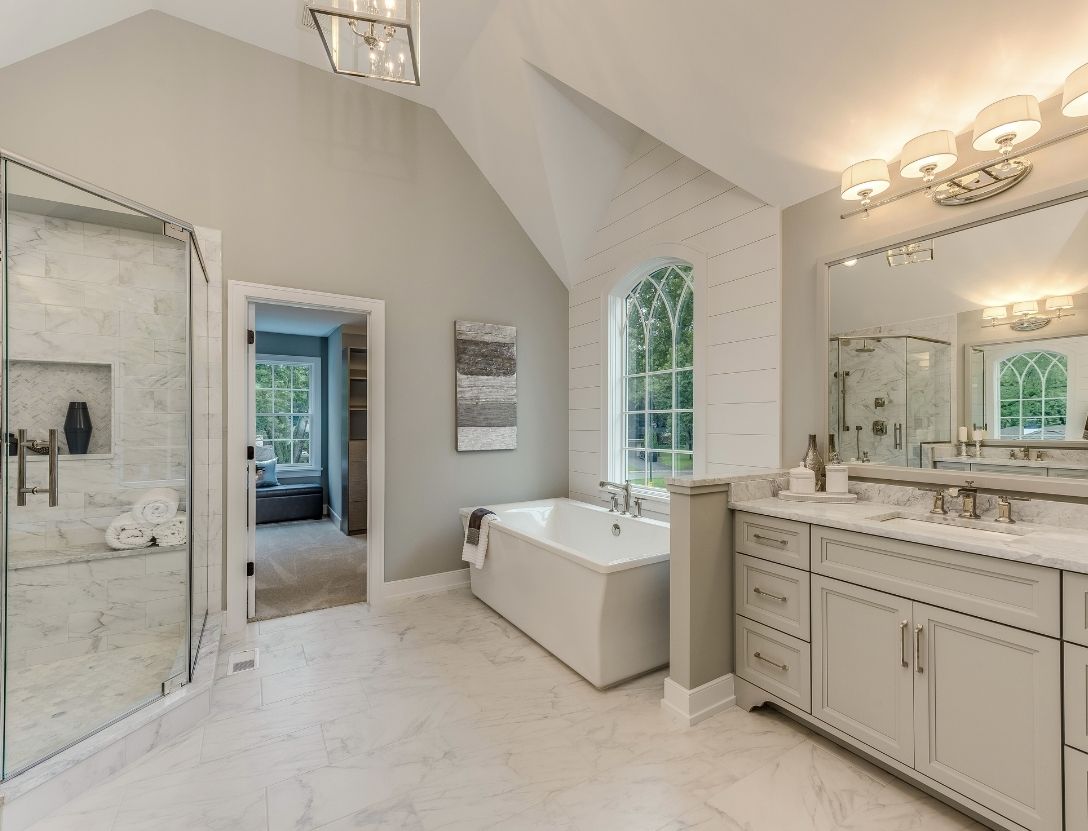 Grand spa like master bathroom with heated floors