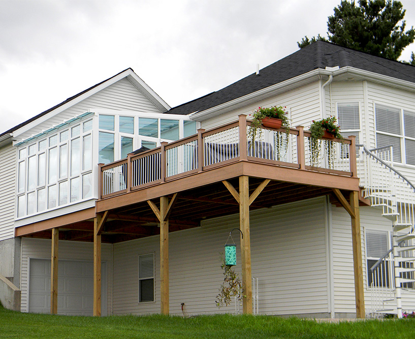 Sunroom addition on second story deck