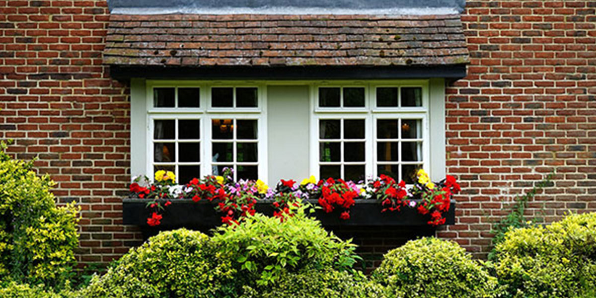 Flowers in window boxes for curb appeal.