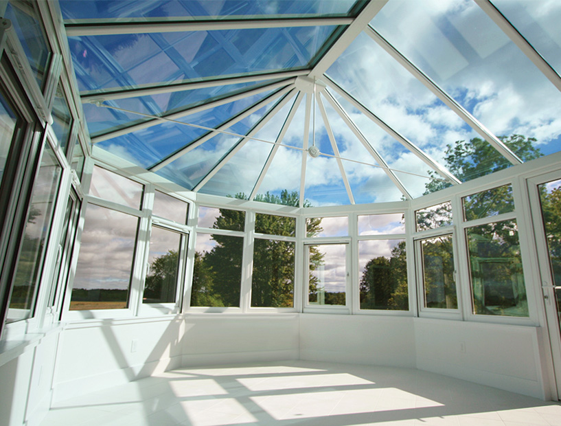 Sunroom surrounded with large windows 