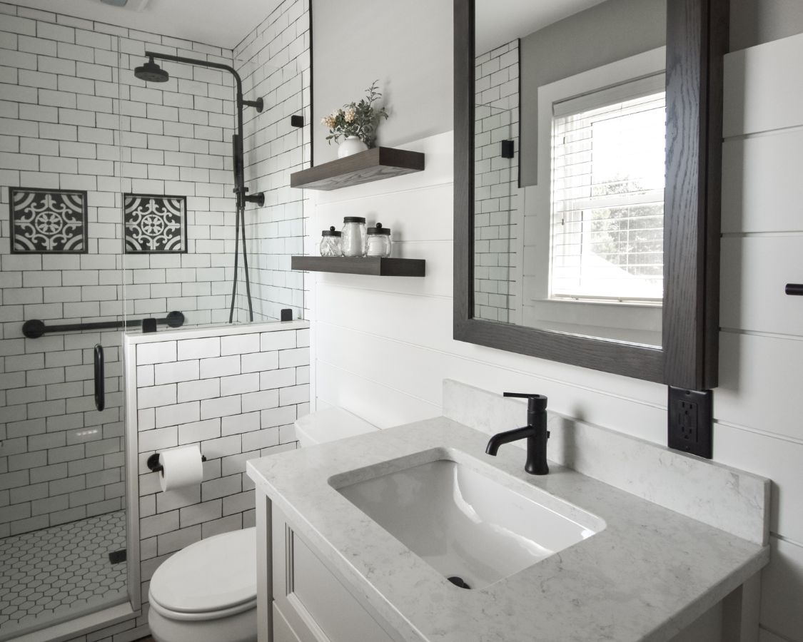 White tile bathroom completing a high-end design