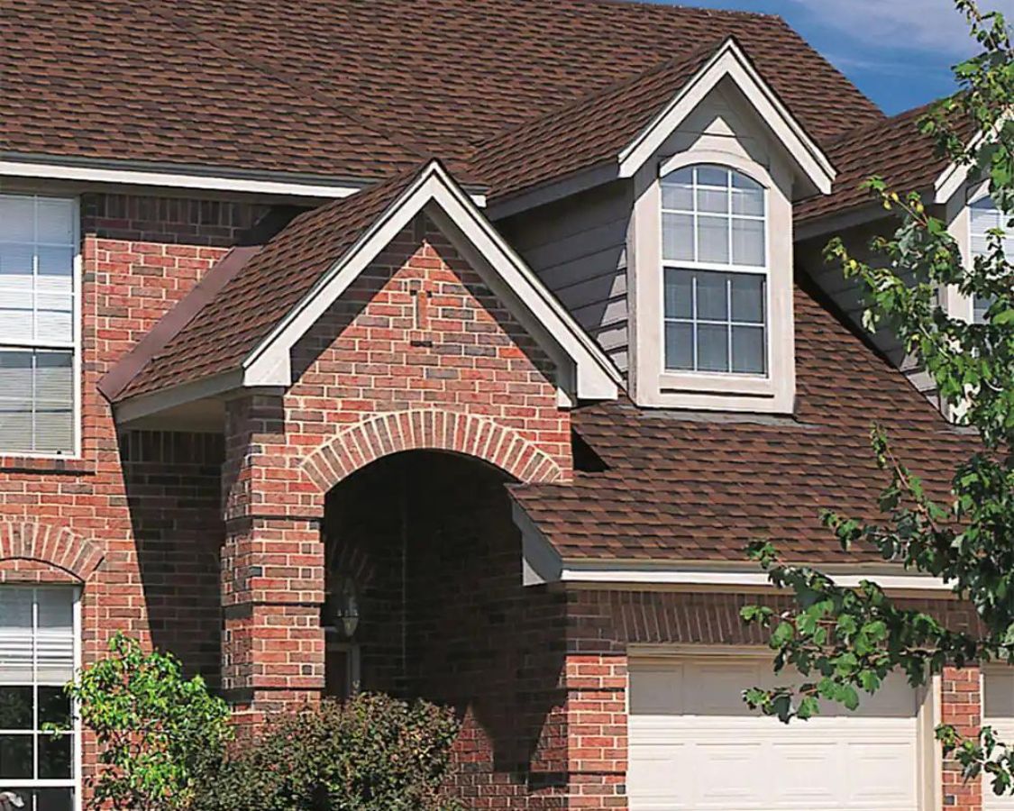 Brick house with brown GAF shingle color