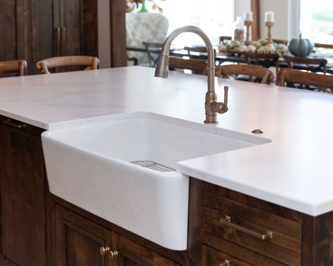 modern country kitchen sink with brass faucet 