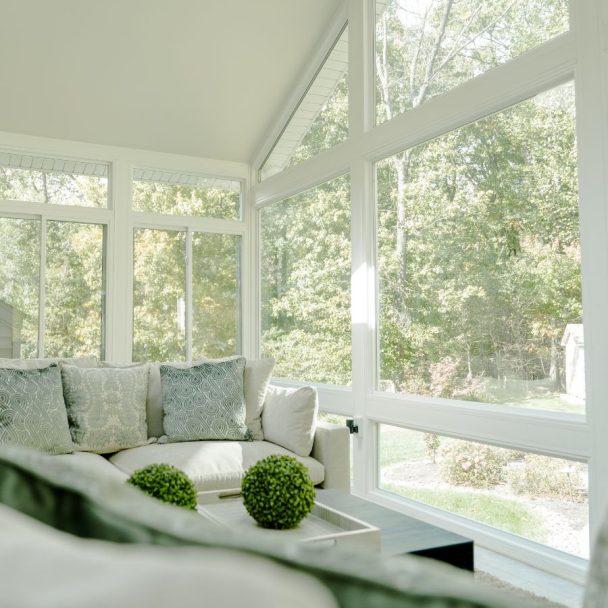 big sunroom windows using white vinyl materials