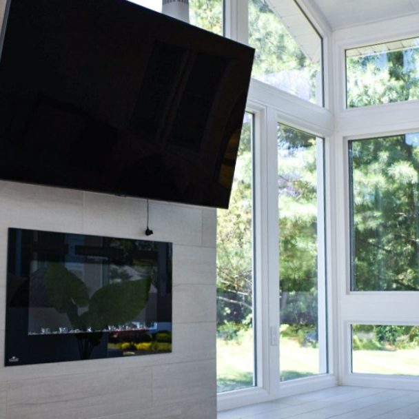 Sunroom ideas with modern fireplace