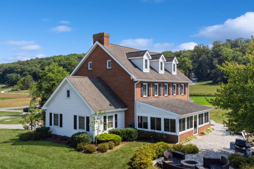 Modern home expansion of brick house 